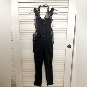 Kids black overalls in a size 7-8 (M).